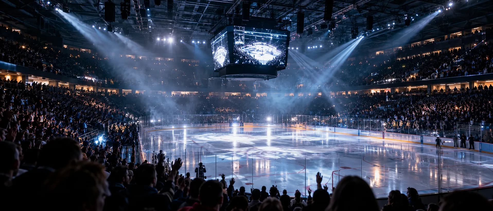 Eishockeyarena kurz vor Spielbeginn, Flutlicht auf dem Eis